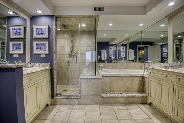 1212 N Lake Shore Dr Unit 21As, Chicago, IL 60610 - bathroom with a shower stall, two vanities, a garden tub, tile patterned flooring, and recessed lighting