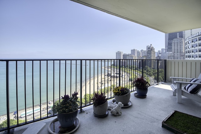 1212 N Lake Shore Dr Unit 21As, Chicago, IL 60610 - balcony with a view of skyline and view of water and beach