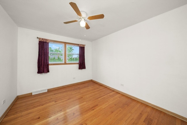 421 Carey Ct, Chicago Heights, IL 60411 - unfurnished room featuring ceiling fan, light wood-type flooring, and baseboards
