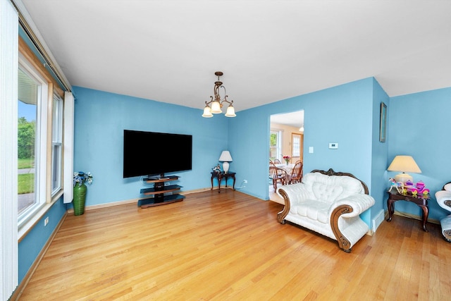 421 Carey Ct, Chicago Heights, IL 60411 - living area with wood finished floors and a chandelier
