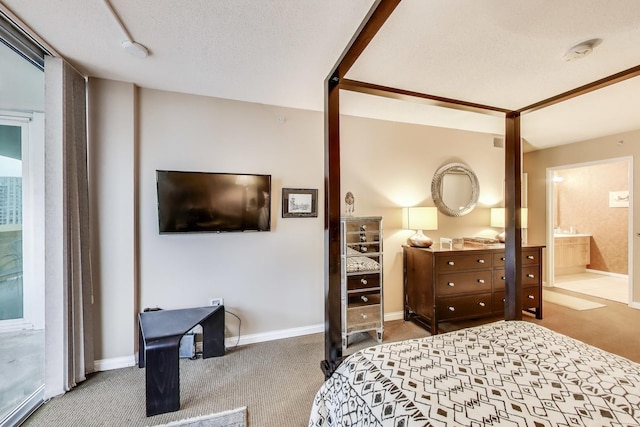 1580 Sherman Ave Unit 1006, Evanston, IL 60201 - carpeted bedroom featuring baseboards, ensuite bathroom, and a textured ceiling