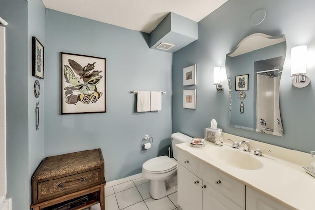1580 Sherman Ave Unit 1006, Evanston, IL 60201 - full bathroom with toilet, vanity, a shower with shower curtain, tile patterned floors, and baseboards