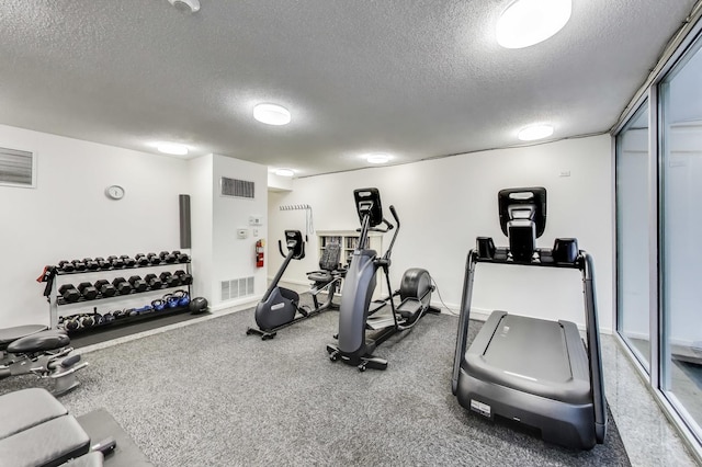 1580 Sherman Ave Unit 1006, Evanston, IL 60201 - workout area with a textured ceiling