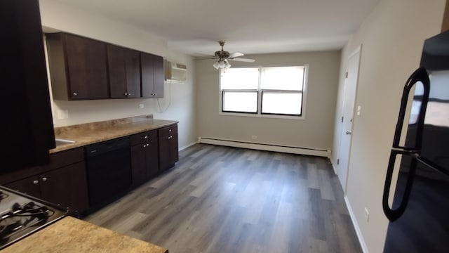 17307 Lathrop Ave, East Hazel Crest, IL 60429 - kitchen featuring black appliances, a baseboard heating unit, wood finished floors, light countertops, and a ceiling fan