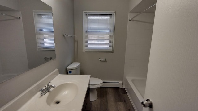 17307 Lathrop Ave, East Hazel Crest, IL 60429 - bathroom featuring a baseboard heating unit, toilet, wood finished floors, and plenty of natural light