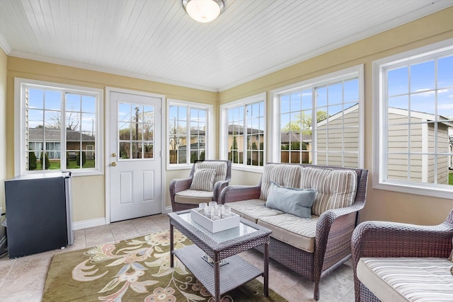 1212 S Greenwood Ave, Park Ridge, IL 60068 - sunroom featuring ornamental molding, tile patterned flooring, and baseboards