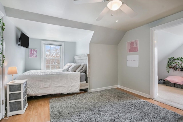 1212 S Greenwood Ave, Park Ridge, IL 60068 - bedroom featuring light wood-style floors, vaulted ceiling, a ceiling fan, and baseboards