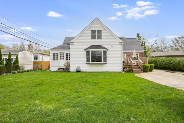 1212 S Greenwood Ave, Park Ridge, IL 60068 - rear view of property with a deck, entry steps, and a shingled roof