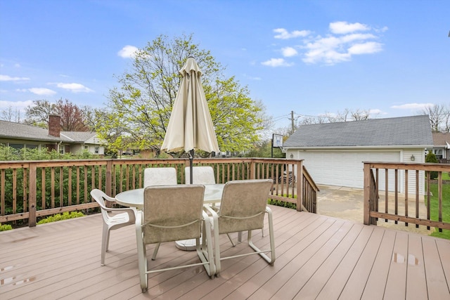 1212 S Greenwood Ave, Park Ridge, IL 60068 - deck with outdoor dining area, an outdoor structure, and a detached garage