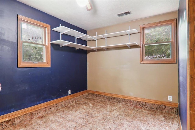 1212 Colton Ave, Bloomington, IL 61701 - carpeted empty room with baseboards
