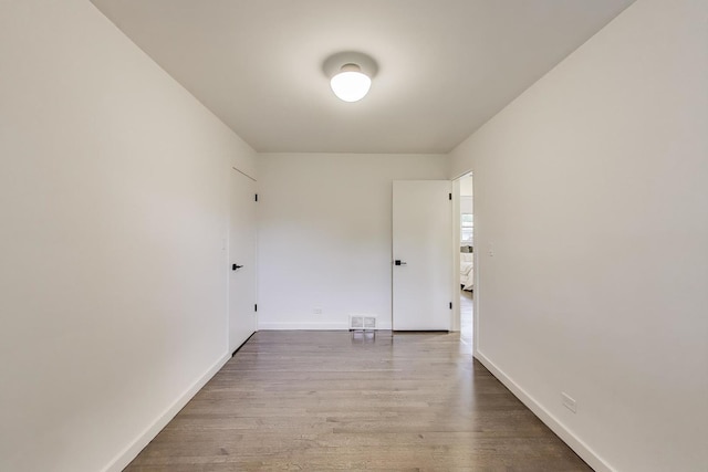 502 S William St, Mount Prospect, IL 60056 - unfurnished room with wood finished floors and baseboards