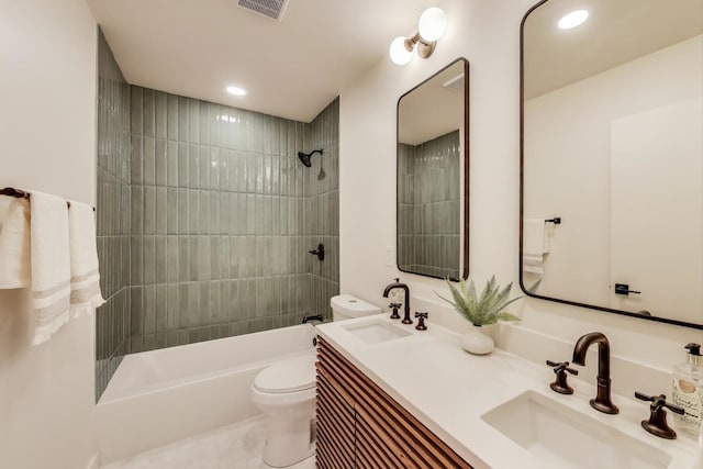 502 S William St, Mount Prospect, IL 60056 - bathroom with toilet, bathing tub / shower combination, double vanity, recessed lighting, and tile patterned floors