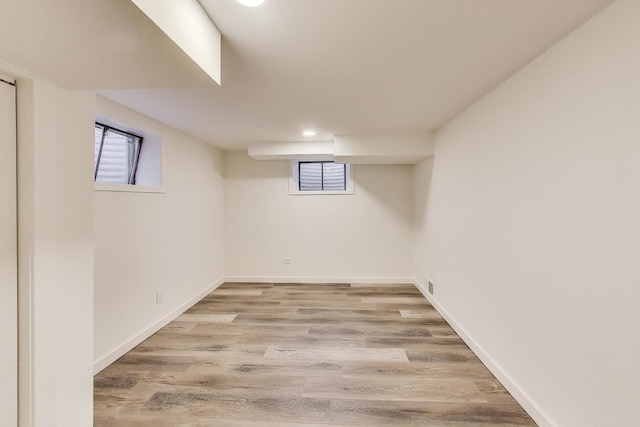 502 S William St, Mount Prospect, IL 60056 - basement featuring plenty of natural light, light wood-style floors, baseboards, and recessed lighting