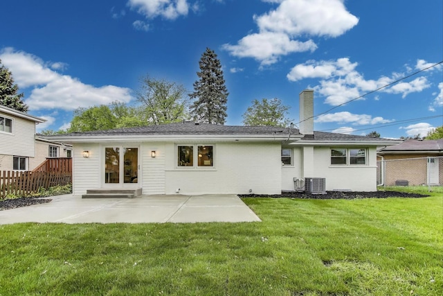 502 S William St, Mount Prospect, IL 60056 - back of property featuring a chimney, a patio, cooling unit, and brick siding