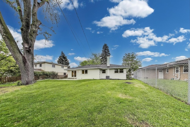 502 S William St, Mount Prospect, IL 60056 - back of property with a chimney and a patio area