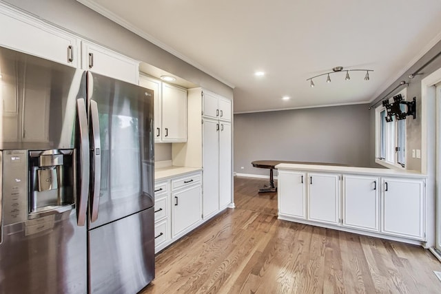 654 N Robinson Dr, Palatine, IL 60074 - kitchen with stainless steel fridge, crown molding, white cabinetry, light countertops, and light wood-type flooring