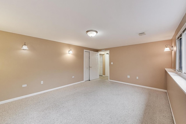 654 N Robinson Dr, Palatine, IL 60074 - unfurnished bedroom with baseboards and light carpet