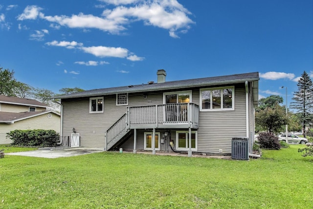 654 N Robinson Dr, Palatine, IL 60074 - rear view of property with cooling unit, stairs, a deck, and a yard