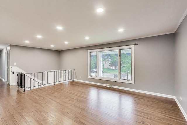 654 N Robinson Dr, Palatine, IL 60074 - unfurnished room featuring baseboards, wood finished floors, recessed lighting, and ornamental molding