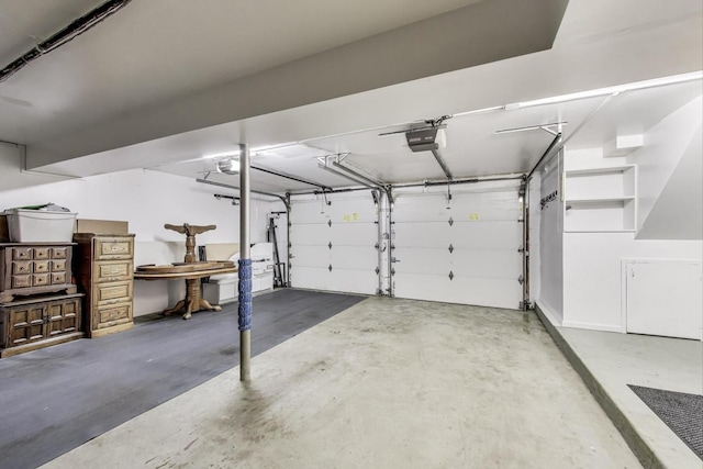 654 N Robinson Dr, Palatine, IL 60074 - garage featuring a garage door opener