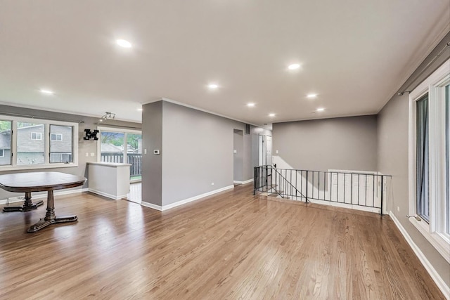 654 N Robinson Dr, Palatine, IL 60074 - spare room featuring wood finished floors, recessed lighting, baseboards, and ornamental molding