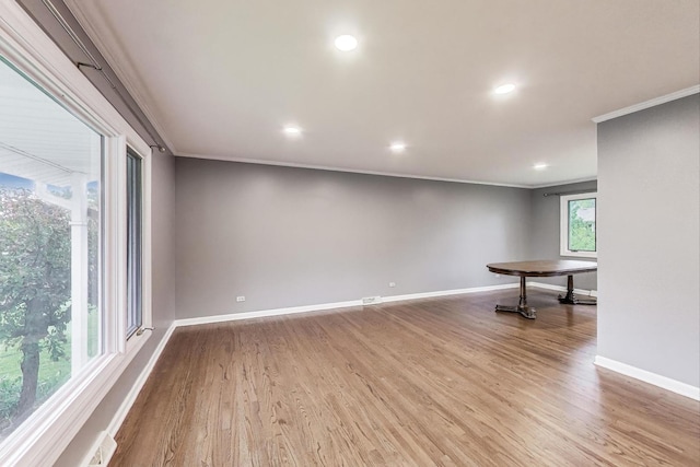 654 N Robinson Dr, Palatine, IL 60074 - unfurnished room featuring ornamental molding, baseboards, wood finished floors, and recessed lighting