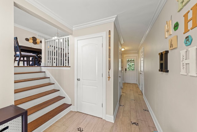 573 Maple Ave, Lisle, IL 60532 - hallway with wood finished floors, ornamental molding, stairs, and baseboards