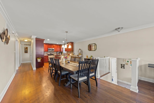 573 Maple Ave, Lisle, IL 60532 - dining space featuring wood finished floors, ornamental molding, baseboards, a chandelier, and recessed lighting