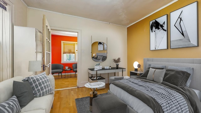 7360 N Damen Ave Unit 1S, Chicago, IL 60645 - bedroom featuring wood finished floors and ornamental molding