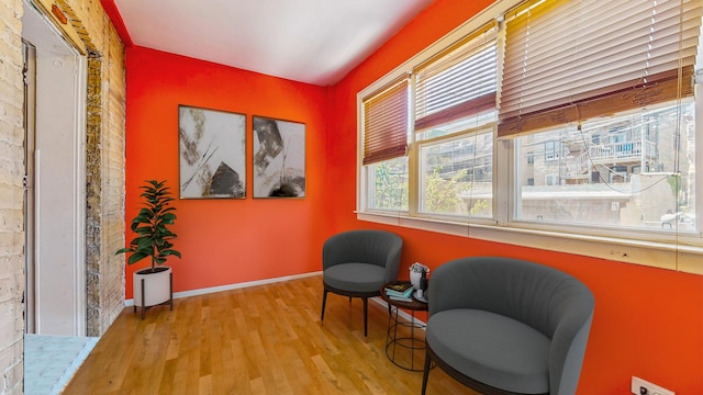 7360 N Damen Ave Unit 1S, Chicago, IL 60645 - sitting room featuring wood finished floors