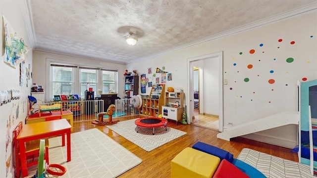 7360 N Damen Ave Unit 1S, Chicago, IL 60645 - game room featuring wood finished floors and ornamental molding