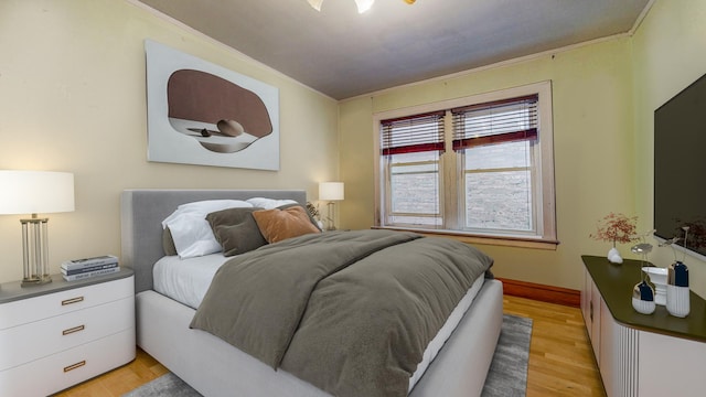 7360 N Damen Ave Unit 1S, Chicago, IL 60645 - bedroom featuring light wood-style floors and baseboards