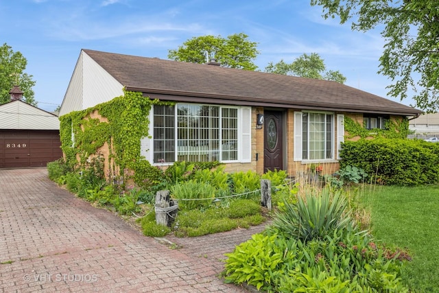 8349 W 82nd St, Justice, IL 60458 - ranch-style home featuring an outbuilding and a garage