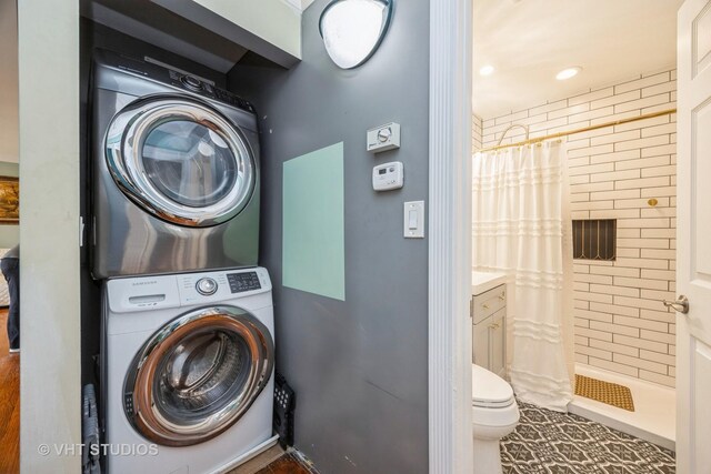 8349 W 82nd St, Justice, IL 60458 - washroom featuring stacked washer and clothes dryer