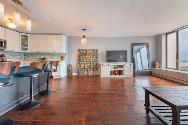 5455 N Sheridan Rd Unit 3006, Chicago, IL 60640 - living area with plenty of natural light and dark wood finished floors