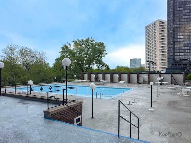 5455 N Sheridan Rd Unit 3006, Chicago, IL 60640 - community pool featuring a patio