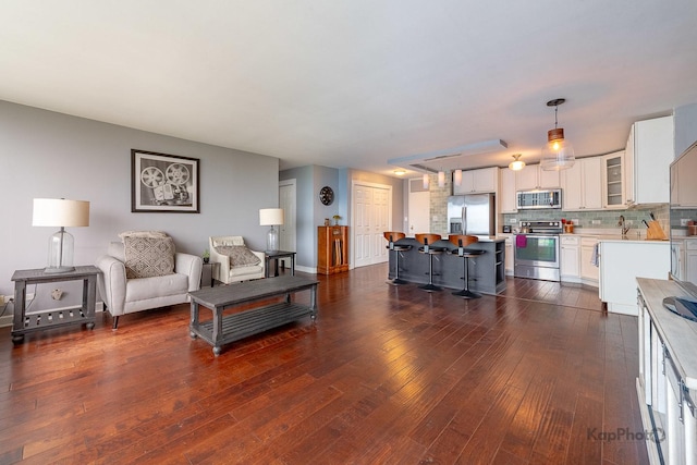 5455 N Sheridan Rd Unit 3006, Chicago, IL 60640 - living area featuring dark wood-style flooring and baseboards