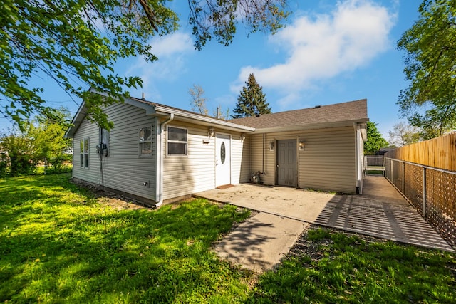 1315 Loral Ave, Joliet, IL 60435 - rear view of house with a patio
