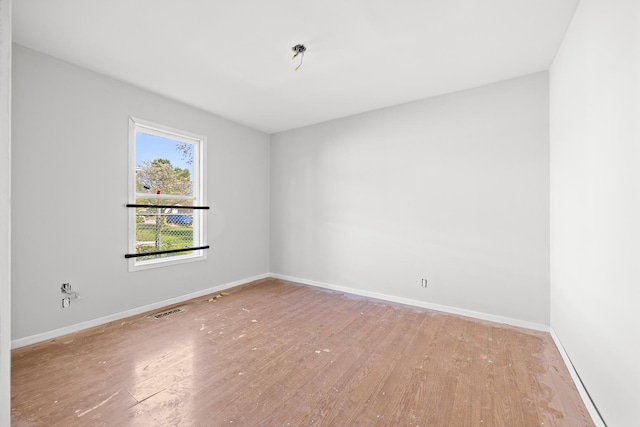 1315 Loral Ave, Joliet, IL 60435 - unfurnished room with wood finished floors and baseboards