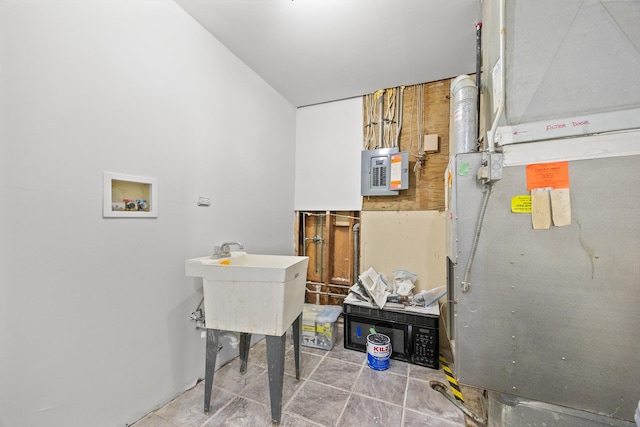 1315 Loral Ave, Joliet, IL 60435 - laundry area featuring hookup for a washing machine, heating unit, and electric panel