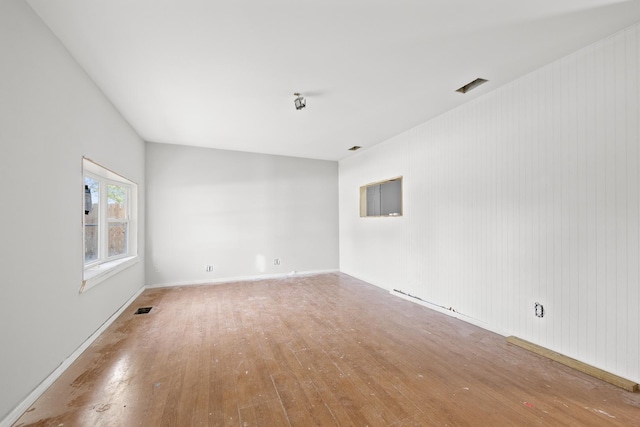 1315 Loral Ave, Joliet, IL 60435 - spare room with hardwood / wood-style flooring and baseboards