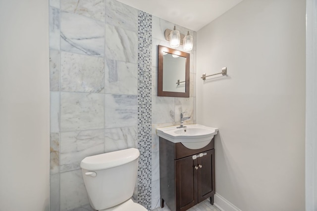 2109 N Harlem Ave Unit 3A, Chicago, IL 60707 - bathroom with vanity, tile walls, and toilet