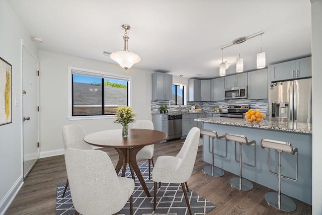 2109 N Harlem Ave Unit 3A, Chicago, IL 60707 - dining area featuring dark wood finished floors and baseboards