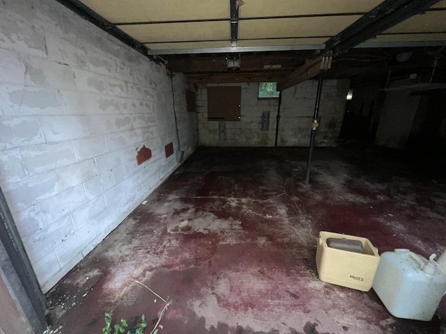 307 Northern Oaks Dr, Groveland, IL 61535 - garage featuring concrete block wall and a garage door opener