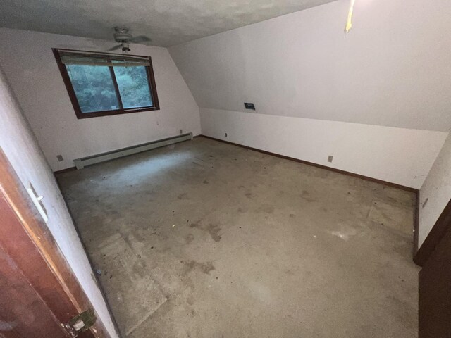 307 Northern Oaks Dr, Groveland, IL 61535 - bonus room with a baseboard heating unit, lofted ceiling, and baseboards