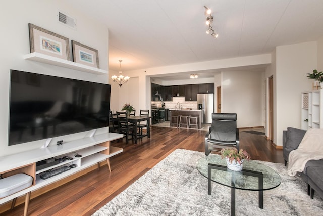 1705 Pavilion Way Unit 401, Park Ridge, IL 60068 - living area with a chandelier and dark wood-type flooring