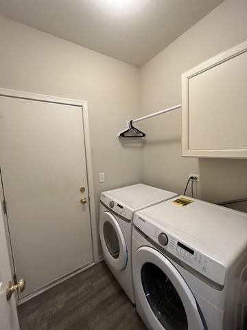 1676 Fredericksburg Ln, Aurora, IL 60503 - laundry room featuring washer and dryer and dark wood finished floors