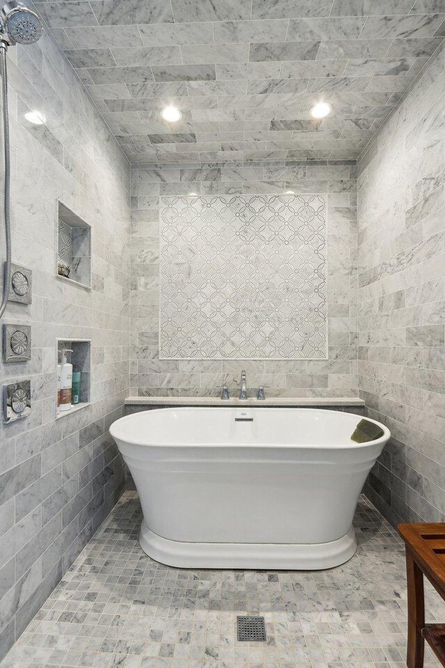 2902 Pleasant Dr, Mchenry, IL 60051 - full bathroom featuring tile walls and a freestanding tub