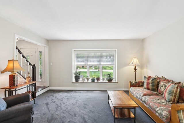 2902 Pleasant Dr, Mchenry, IL 60051 - carpeted living room featuring healthy amount of natural light, stairway, and baseboards