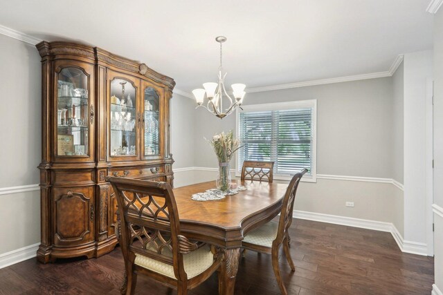 2902 Pleasant Dr, Mchenry, IL 60051 - dining space with a chandelier, dark wood-style floors, baseboards, and ornamental molding